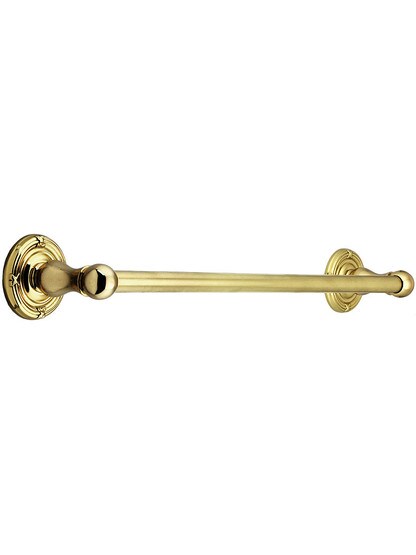 18 inch Brass Towel Bar with Ribbon and Reed Rosettes in Polished Brass.